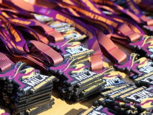 Na zdjęciu medale za udział w biegu - Uliczna Mila