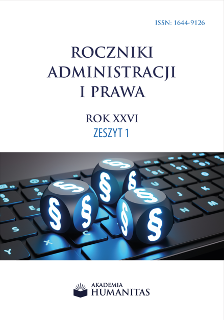 Okładka czasopisma „Roczniki Administracji i Prawa”, rok XXVI, zeszyt 1. W górnej części znajduje się tytuł oraz numer ISSN na jasnym tle. W dolnej części widoczna jest grafika przedstawiająca klawiaturę komputerową, na której umieszczono kostki z podświetlanymi symbolami paragrafu. Na dole znajduje się logo wydawcy – Akademii Humanitas. Całość łączy motywy prawa i technologii w nowoczesnej formie.